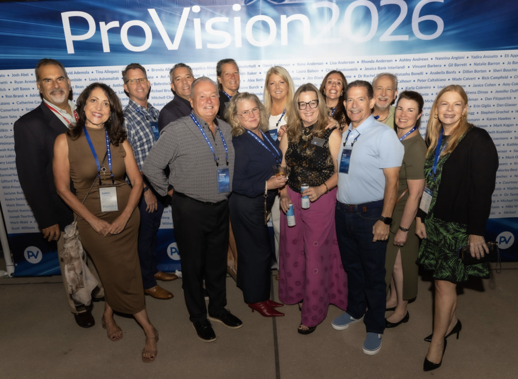 New England ProVisors Leaders infront of banner